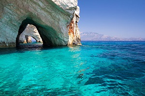 Stone arches carved by wave action along the Mediterranean coast