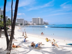 people relaxing on a hawaiian beach